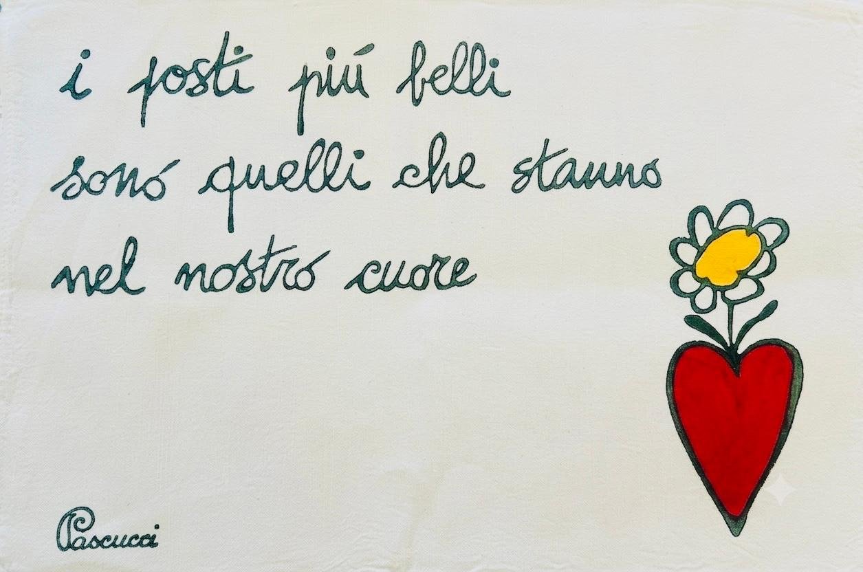 Illustrazione con una frase sul cuore e un fiore rosso